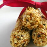 sesame honey candy wrapped in a red ribbon