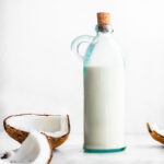 coconut milk in a bottle with a cork