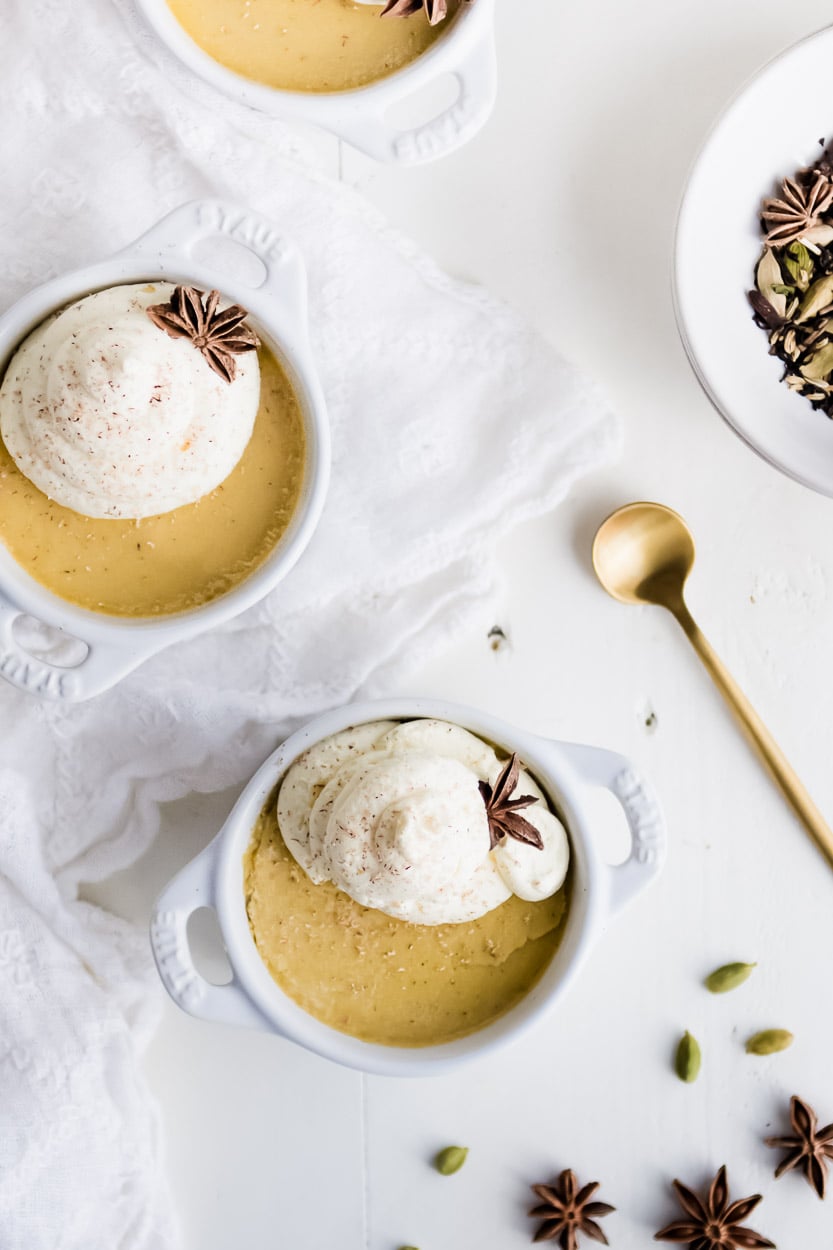 Chai custard with whipped cream and star anise and cardamom