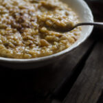 closeup ofsweet risotto in dish on wooden background