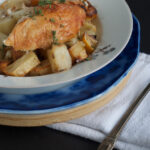 roast chicken on plate with vegetables