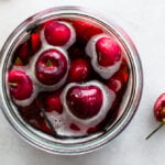 cherry infusion in a container