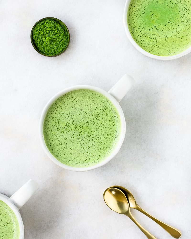 two cups of matcha green tea latte