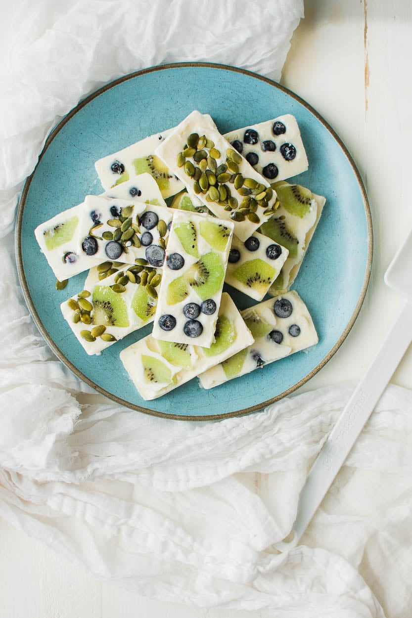 Frozen Yogurt Bars with kiwi, blueberries and pepitas.