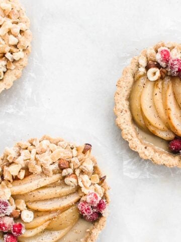 tarts with pears, berries, and hazelnuts