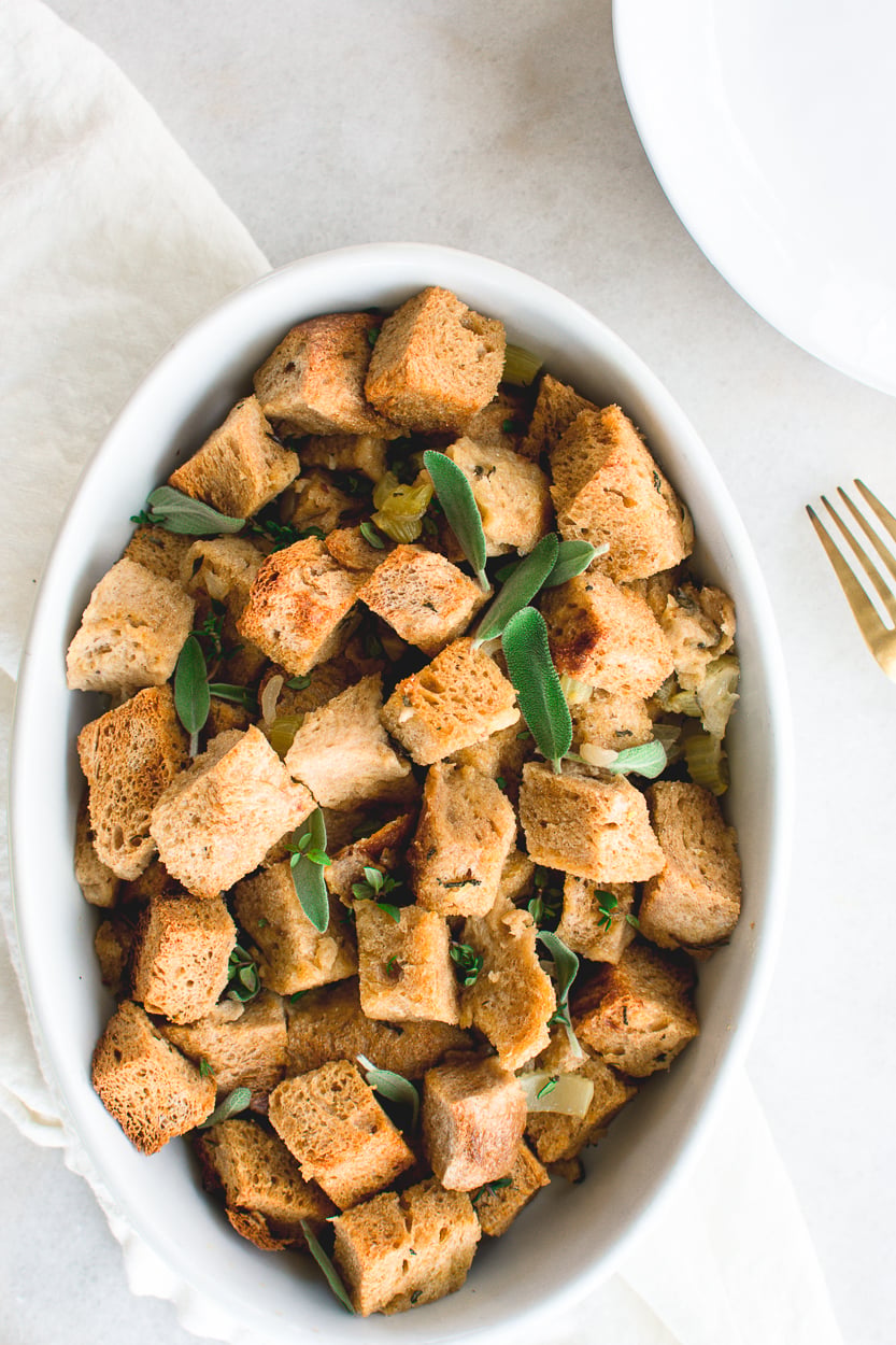 Fragrant Sourdough Stuffing made with bread, broth, butter, sage, rosemary and thyme.