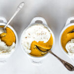 three small bowls of pumpkin custard