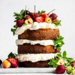 almond cake with cherries, strawberries and mint
