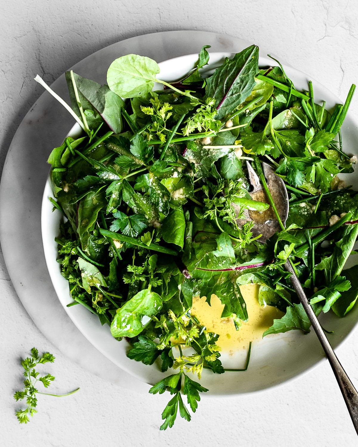 Herb Salad in a white bowl