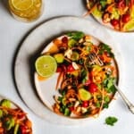 thai-inspired tomato and cucumber salad on marble surface